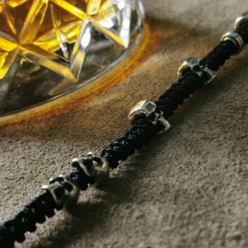 Sterling Silver Macrame Bracelet with Skulls and Spiral Stoppers - Unique 'Six' Clasp Design