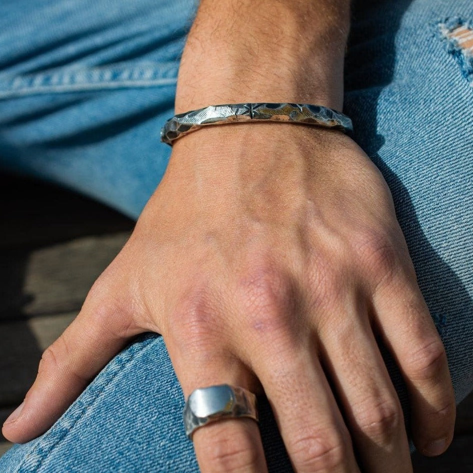 Viking-Inspired Silver Cuff Bracelet with Intricate North Star Carving