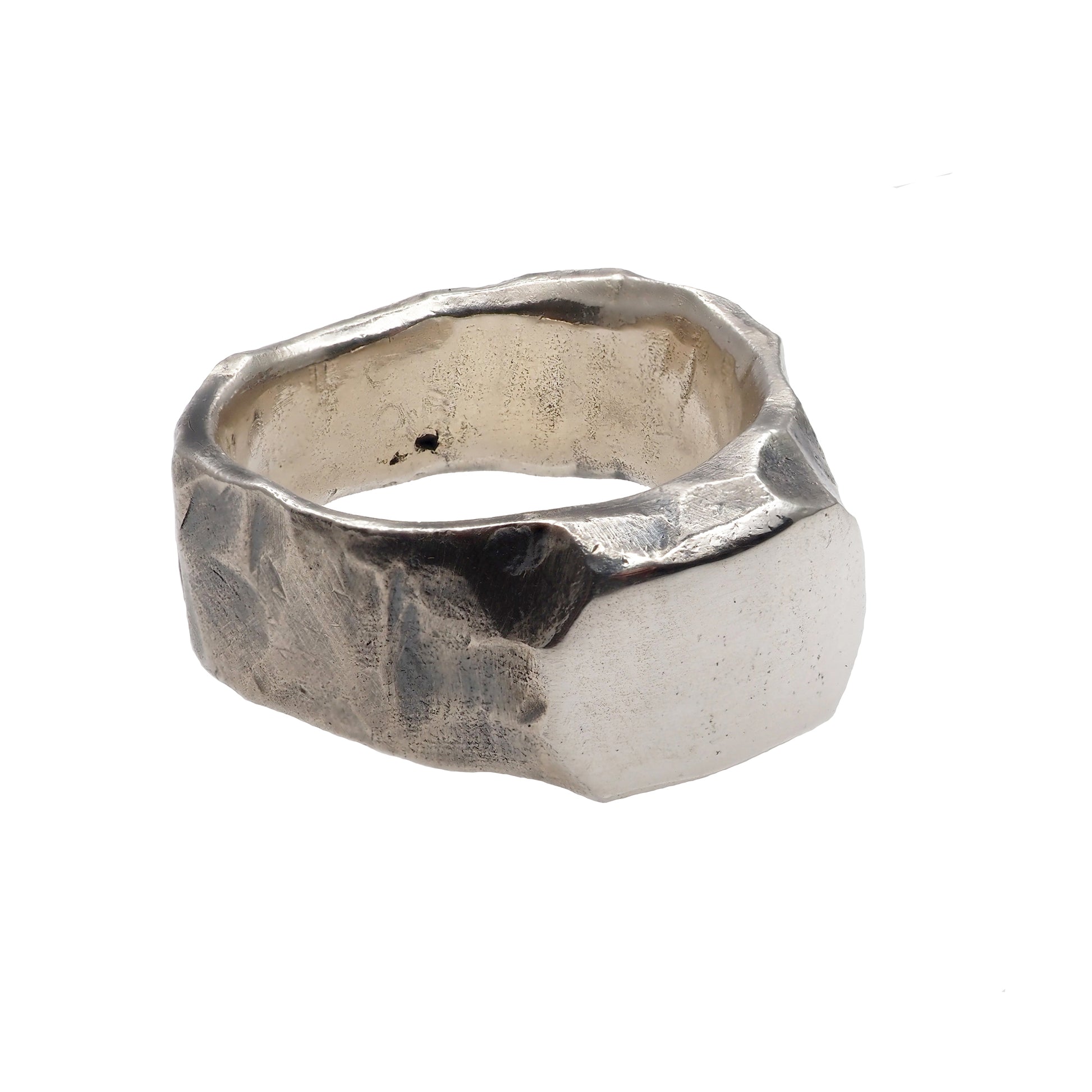 silver ring turned to the right corner on the white background